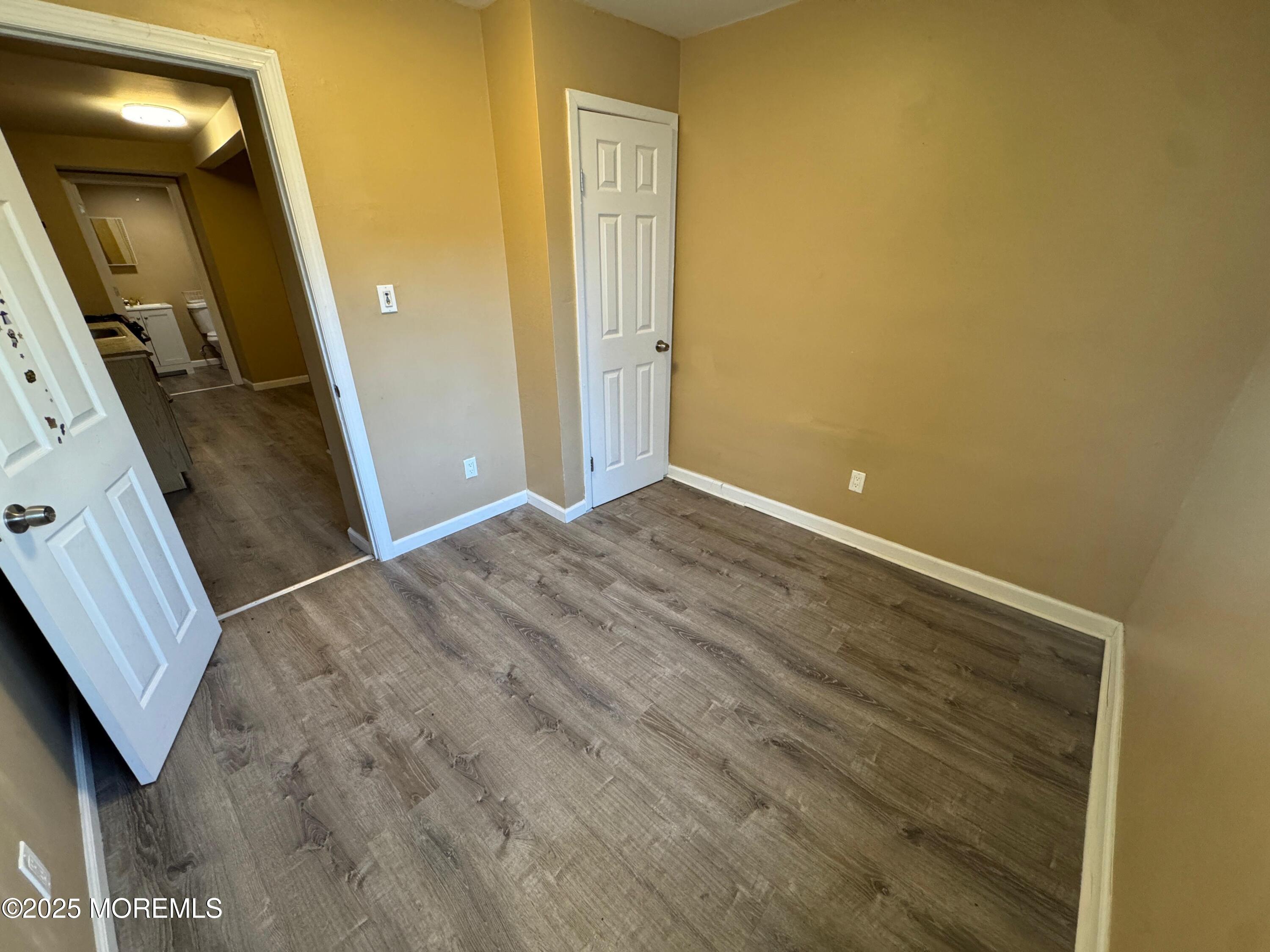 724 Cortlandt Street, Unit 5 Perth Amboy, NJ 08861 - Photo 4 of 10 a view of a hallway