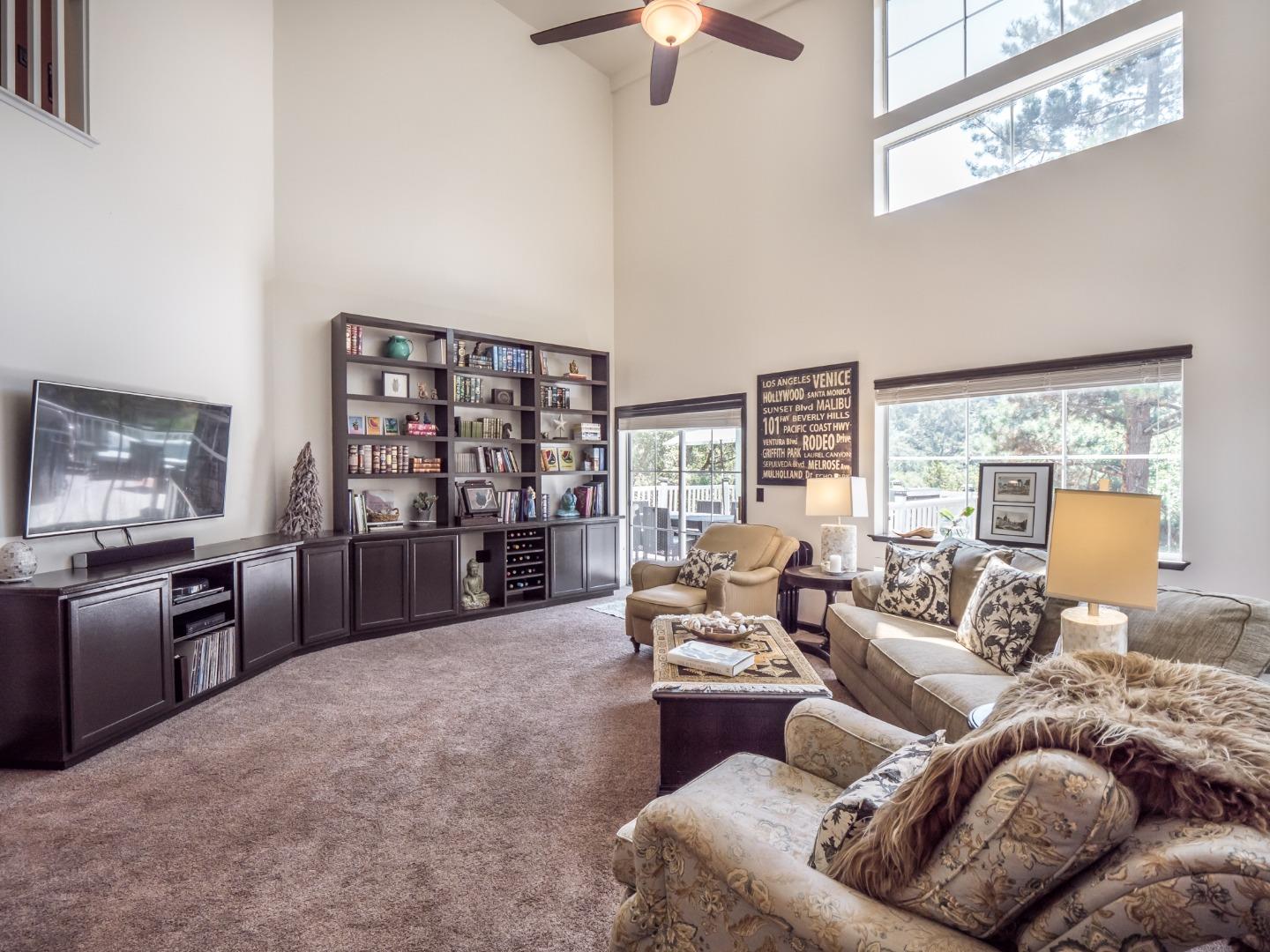 2185 Hames Road Aptos, CA 95003 - Photo 15 of 88 a living room with furniture kitchen view and large windows