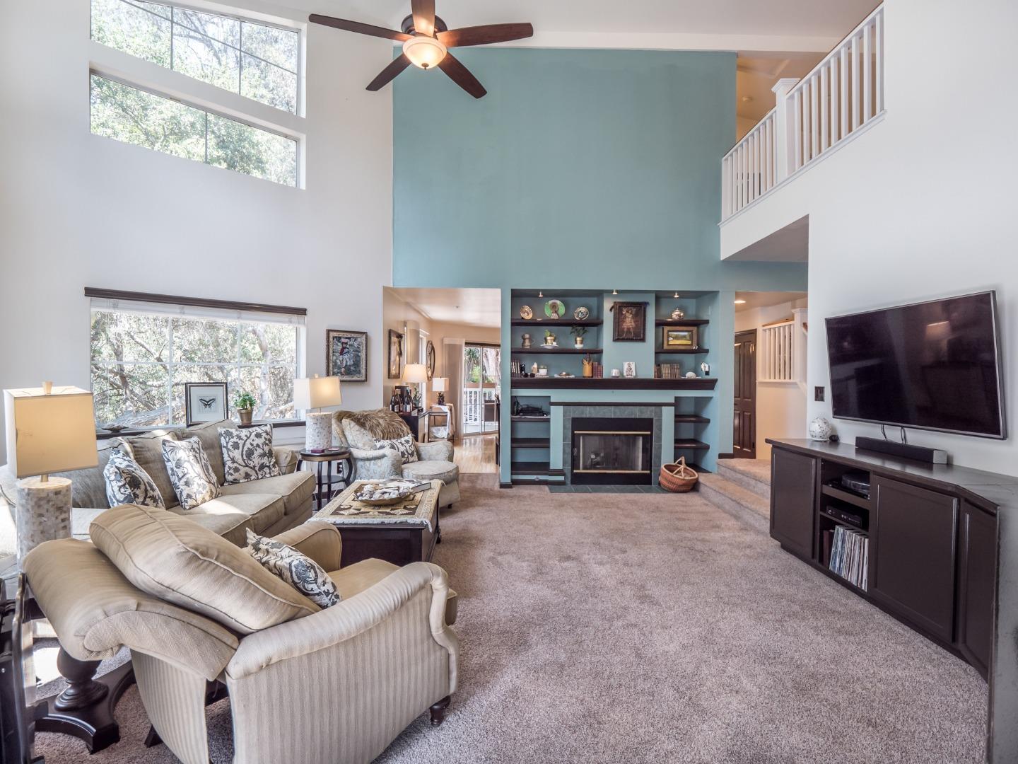 2185 Hames Road Aptos, CA 95003 - Photo 17 of 88 a living room with furniture and a flat screen tv