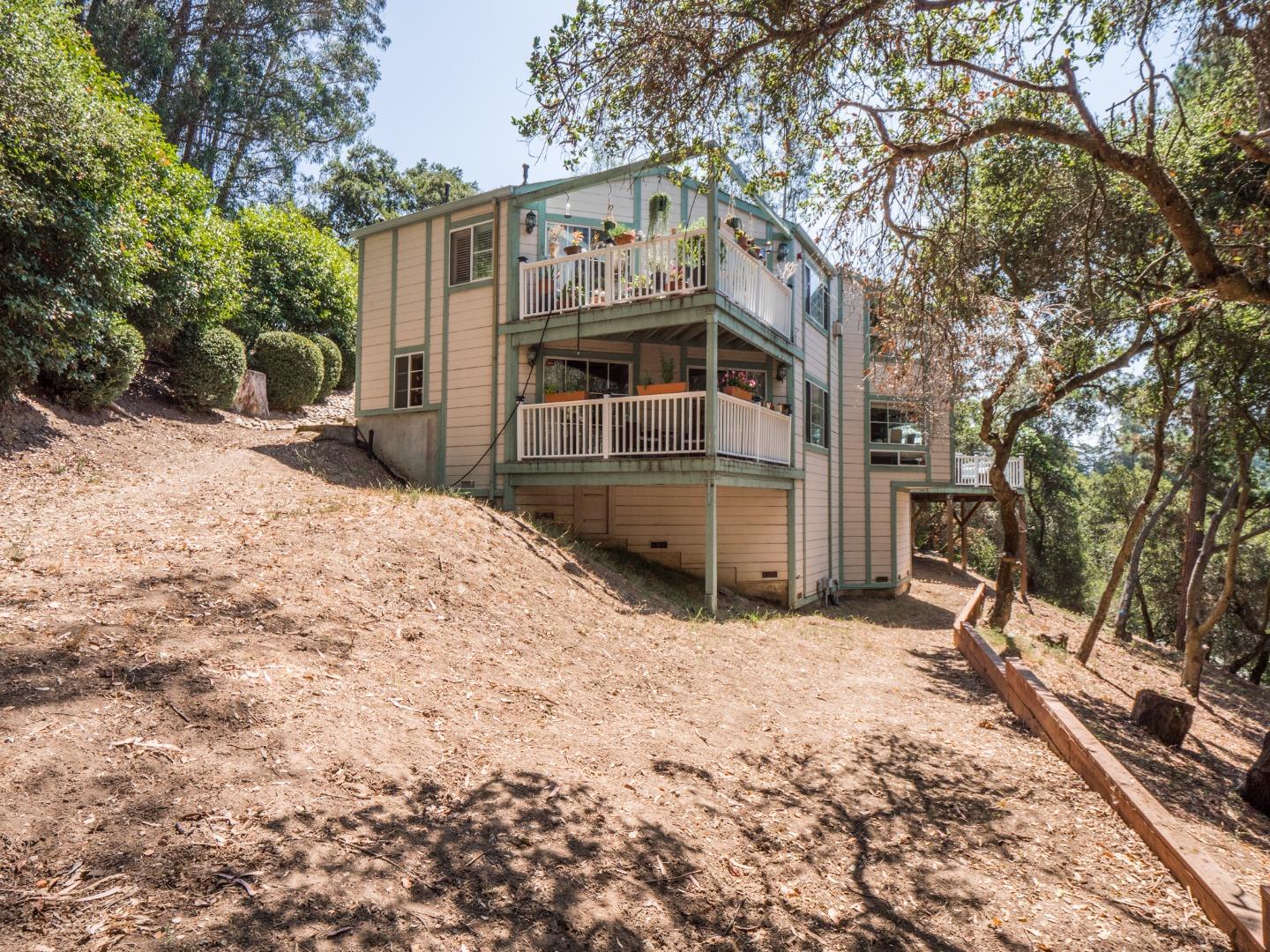 2185 Hames Road Aptos, CA 95003 - Photo 2 of 88 a view of a house with a yard covered in snow