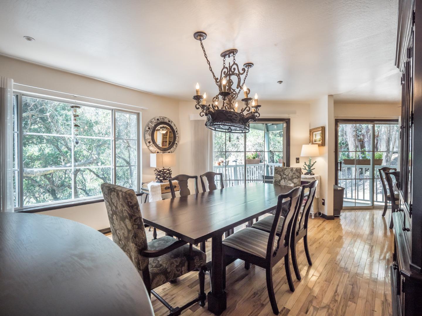 2185 Hames Road Aptos, CA 95003 - Photo 21 of 88 a view of a dining room with furniture wooden floor and chandelier