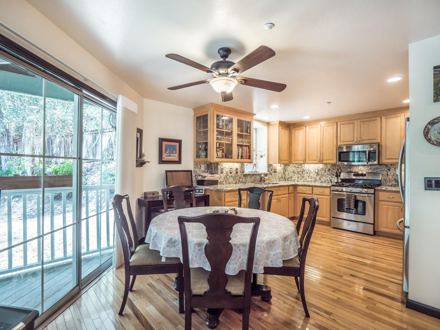 2185 Hames Road Aptos, CA 95003 - Photo 22 of 88 a view of a dining room with furniture window and wooden floor