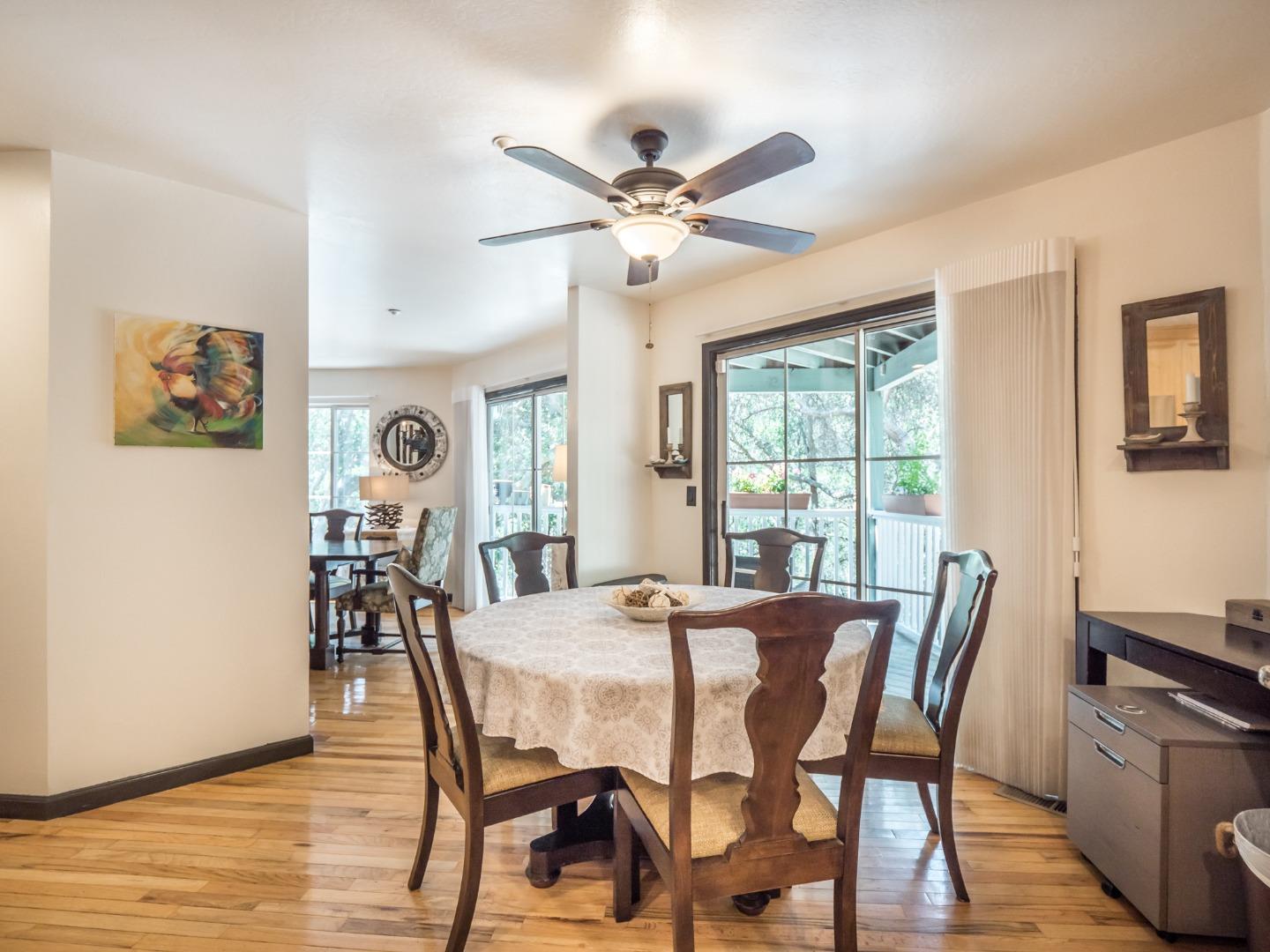 2185 Hames Road Aptos, CA 95003 - Photo 27 of 88 a dining room with furniture a chandelier and wooden floor