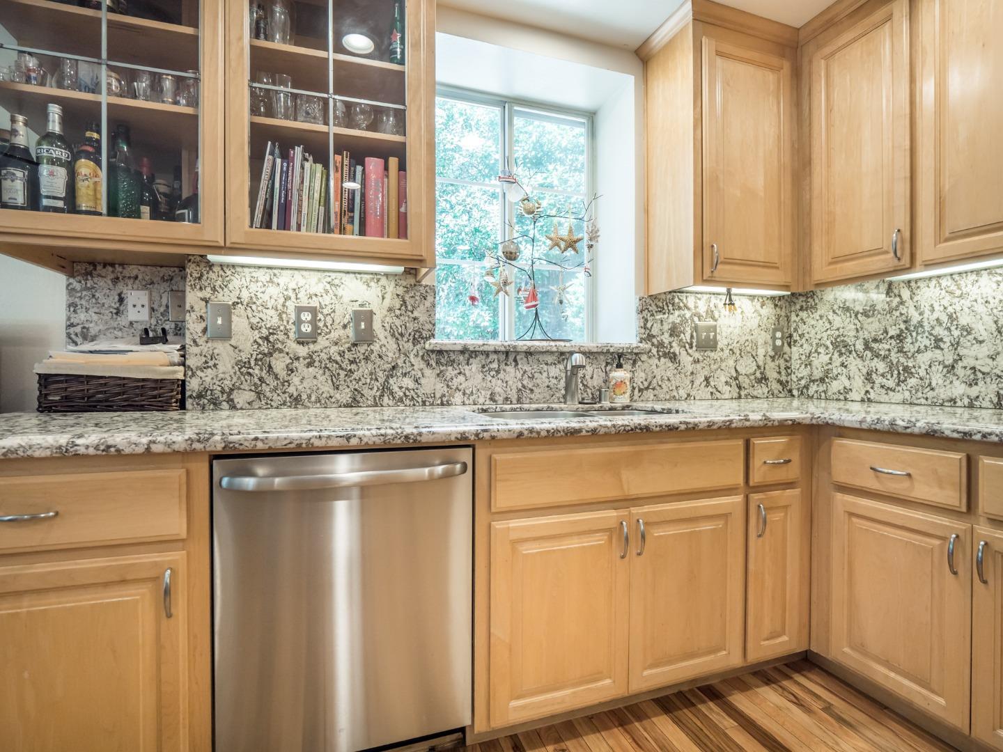2185 Hames Road Aptos, CA 95003 - Photo 30 of 88 a kitchen with stainless steel appliances granite countertop white cabinets and a window