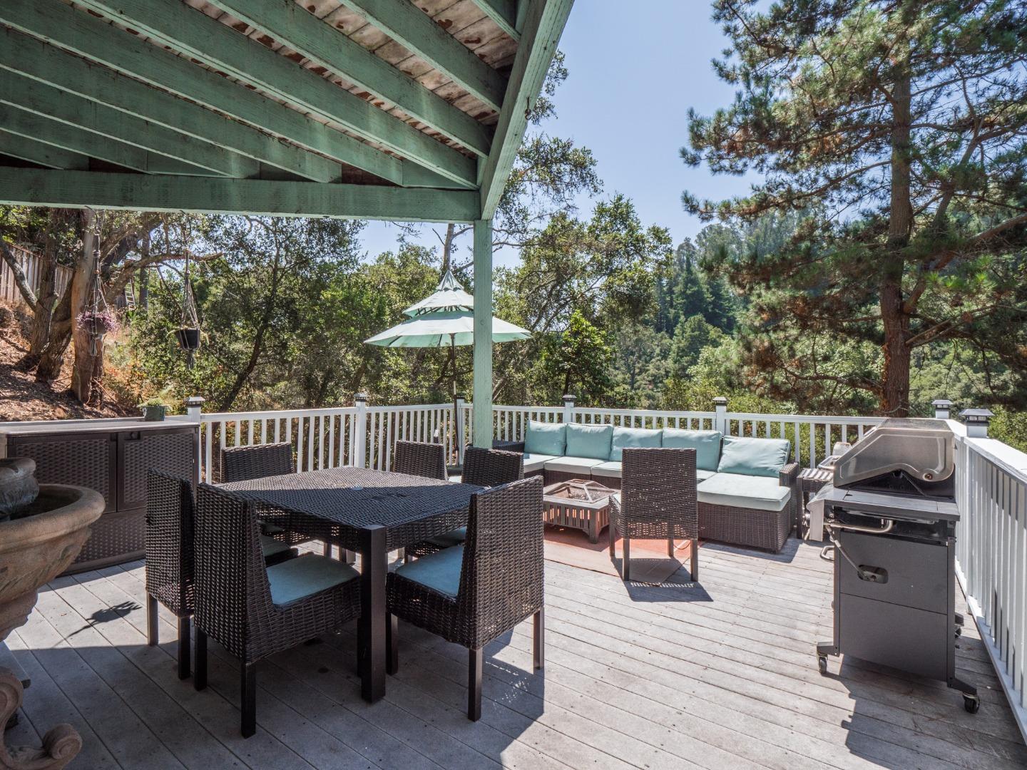 2185 Hames Road Aptos, CA 95003 - Photo 56 of 88 a view of a deck with furniture and trees