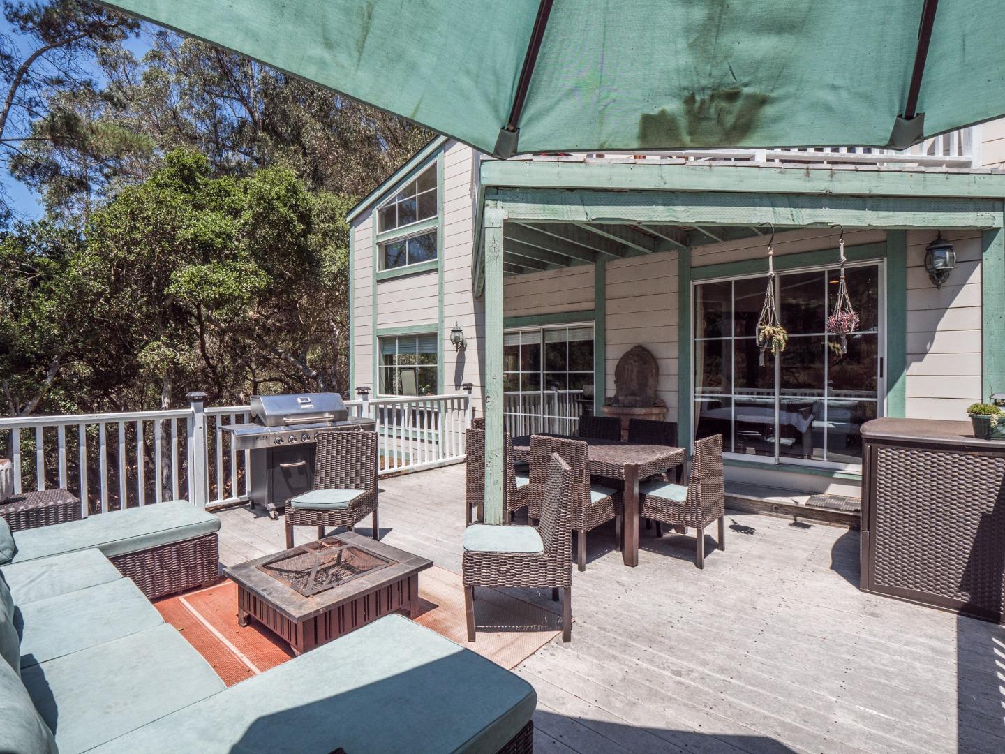 2185 Hames Road Aptos, CA 95003 - Photo 59 of 88 a view of a patio with couches chairs and wooden floor