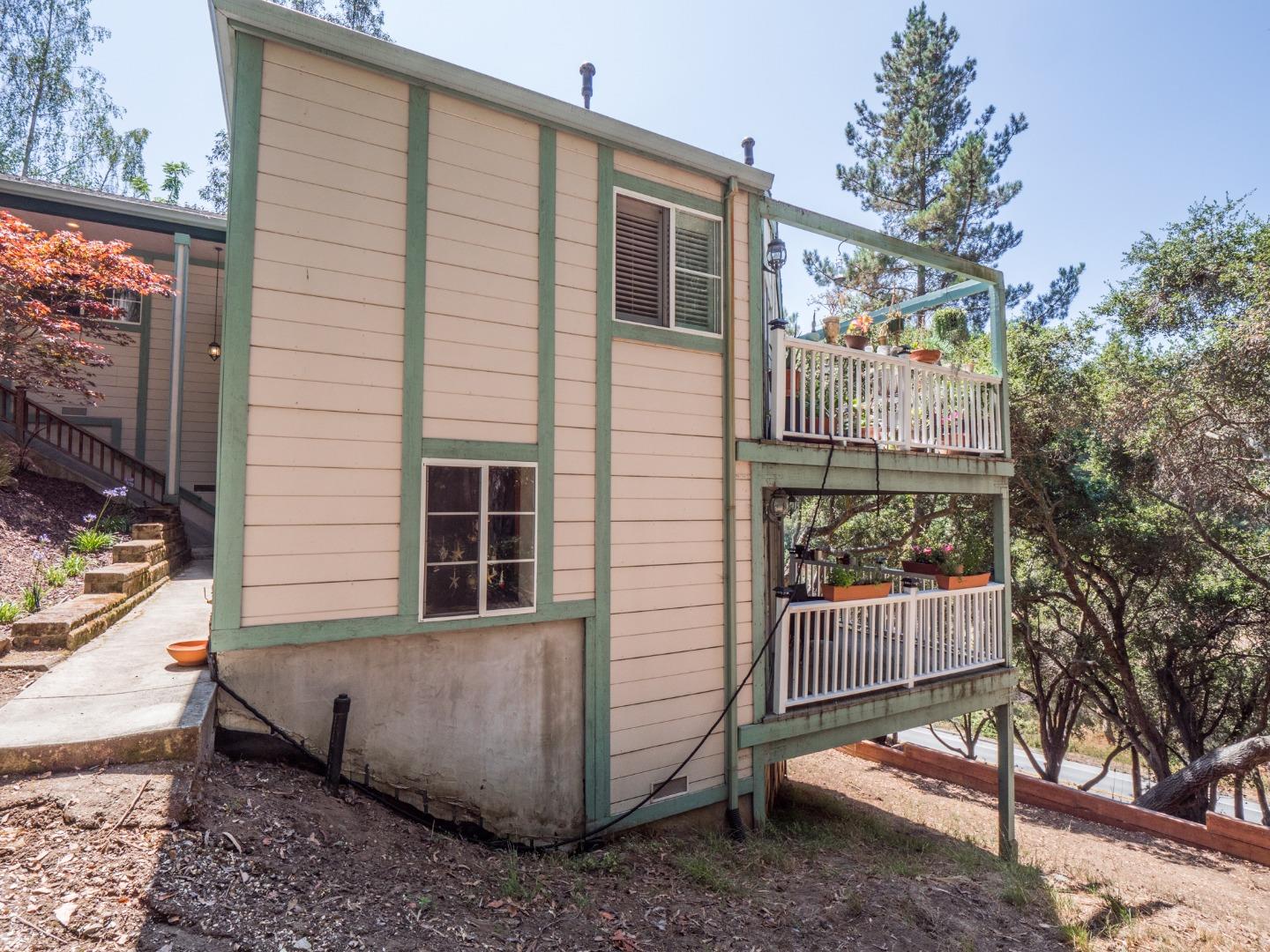 2185 Hames Road Aptos, CA 95003 - Photo 74 of 88 a view of a house with backyard and a tree
