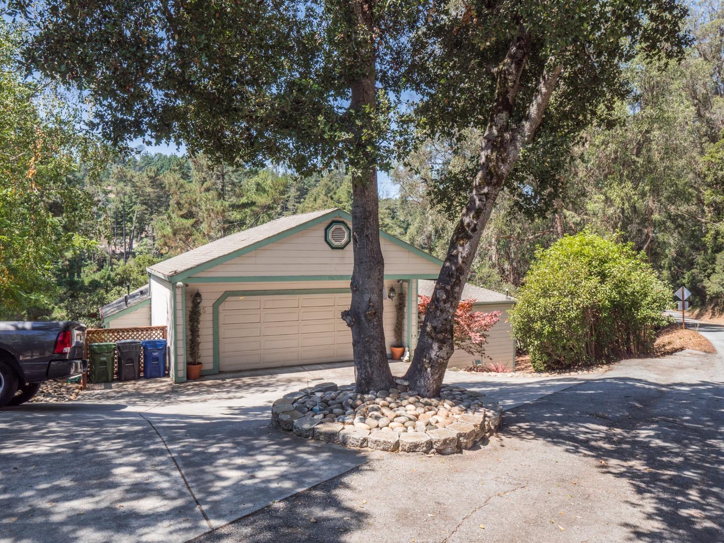 2185 Hames Road Aptos, CA 95003 - Photo 75 of 88 a front view of a house with a yard and garage