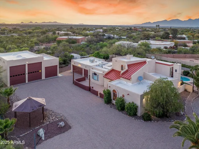 an aerial view of a house with a garden