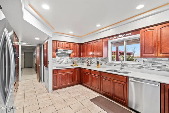 a kitchen with a sink and a cabinets