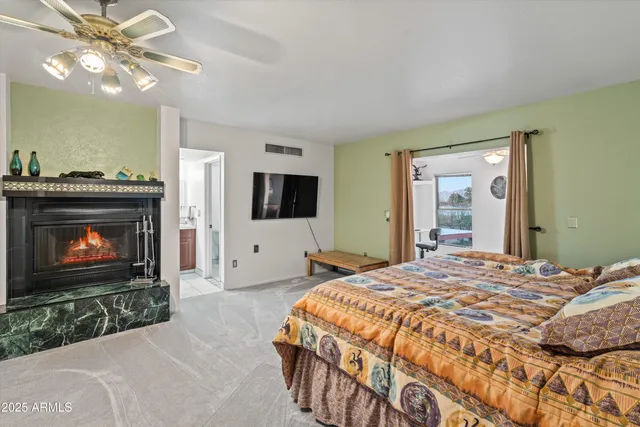 a bathroom with a sink vanity and mirror
