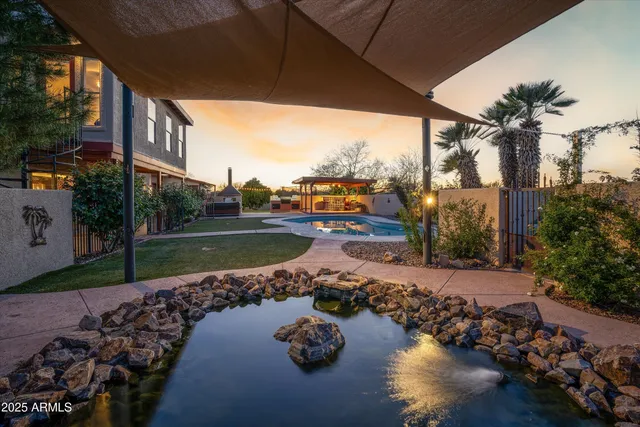 a couple of cars parked in front of a house