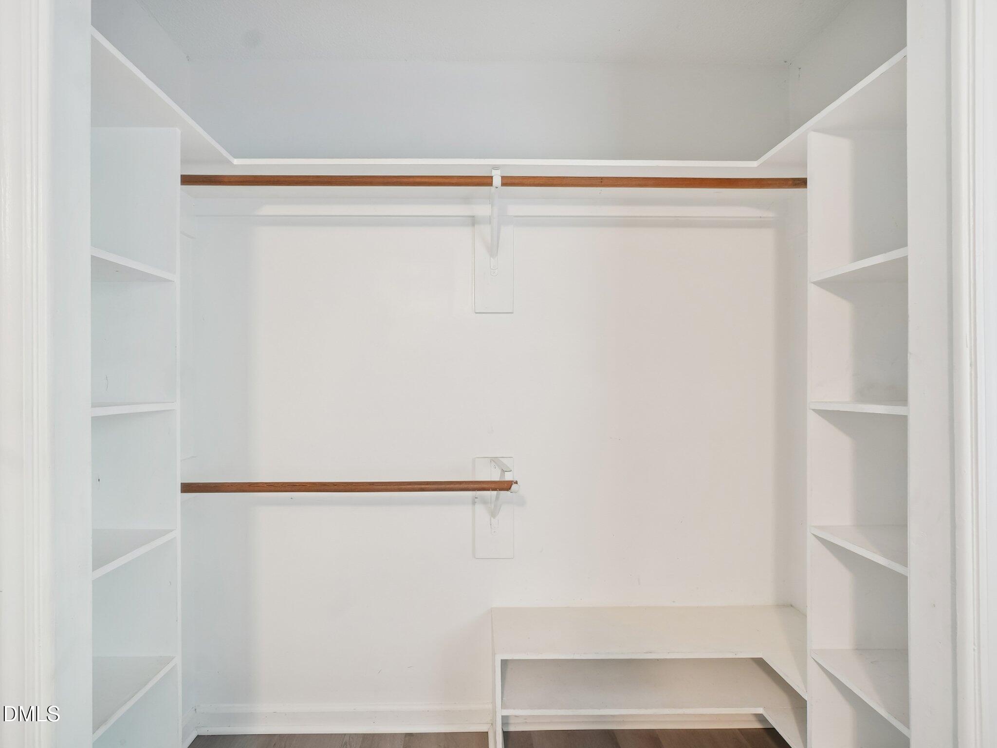2146 Charles Street, Unit 37 Durham, NC 27707 - Photo 16 of 24 a view of walk in closet with empty racks