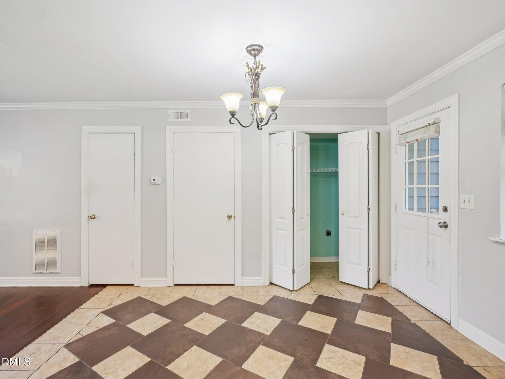 2146 Charles Street, Unit 37 Durham, NC 27707 - Photo 9 of 24 a view of a room with window and chandelier