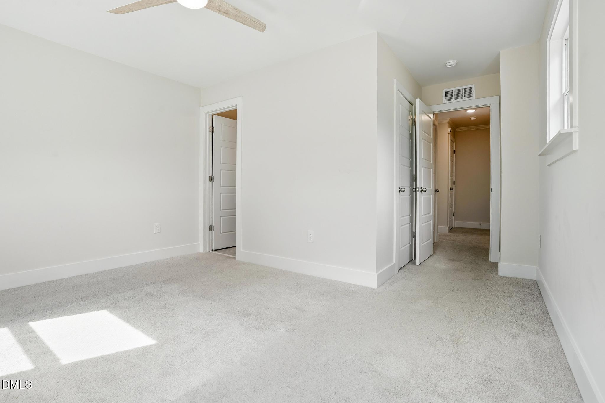 551 Homeland Avenue Durham, NC 27707 - Photo 14 of 32 an empty room with a bathroom and a sink