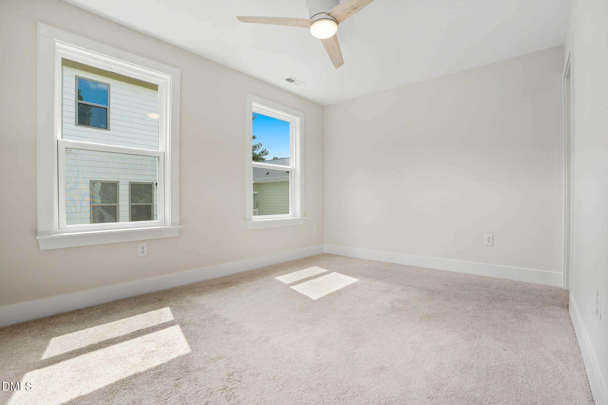 551 Homeland Avenue Durham, NC 27707 - Photo 15 of 32 a view of an empty room with a window