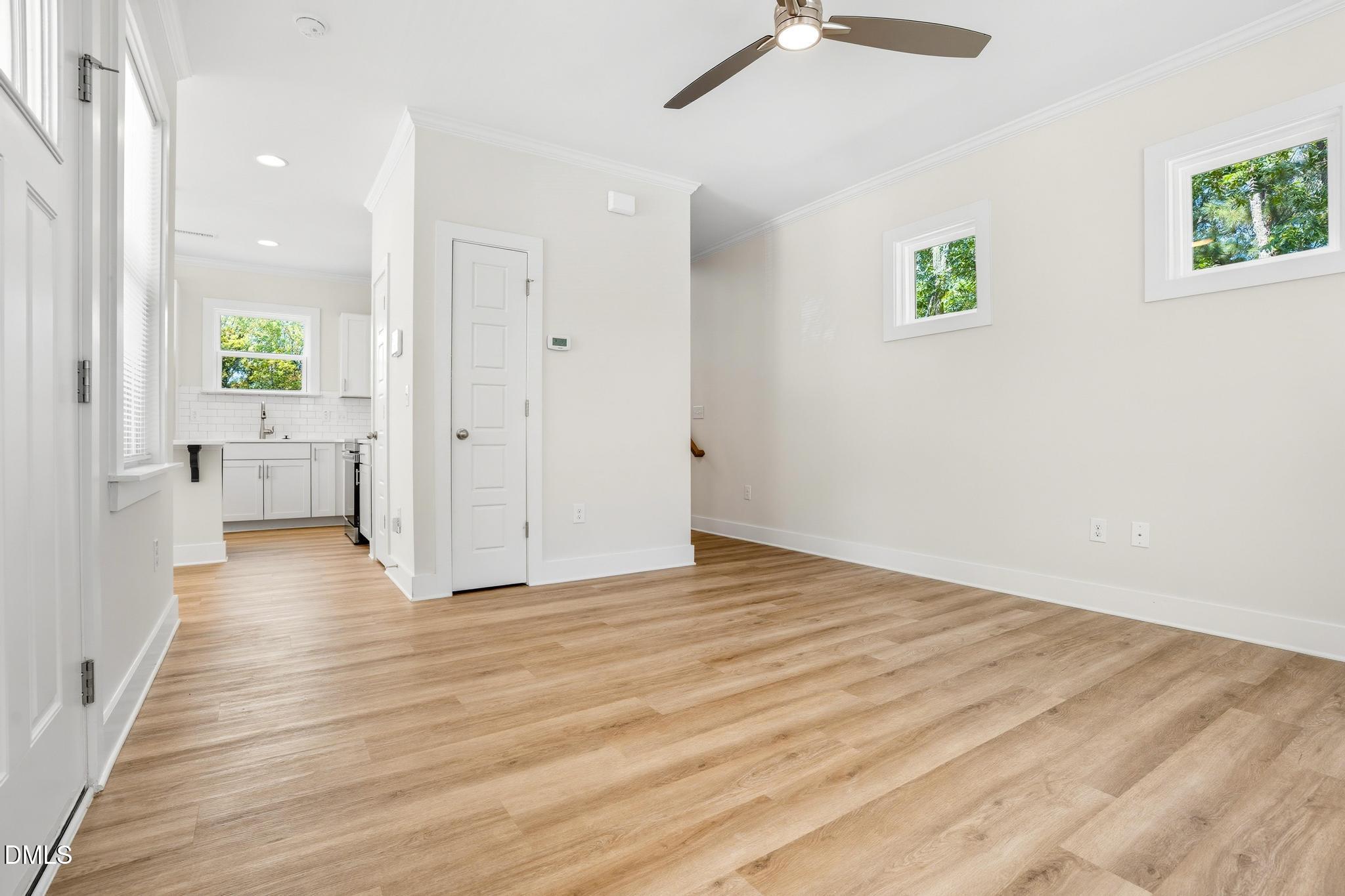 551 Homeland Avenue Durham, NC 27707 - Photo 2 of 32 a view of an empty room and window