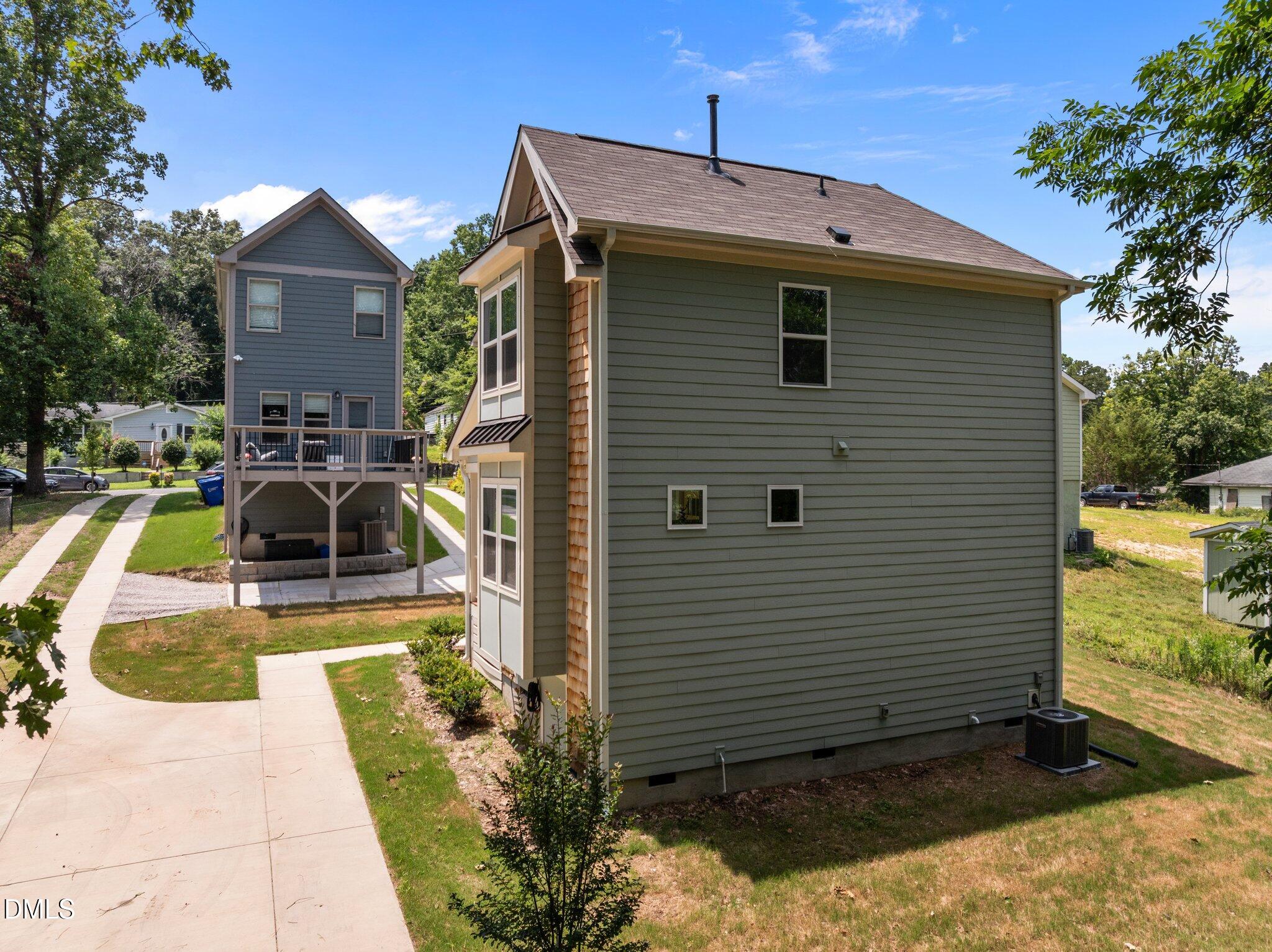 551 Homeland Avenue Durham, NC 27707 - Photo 30 of 32 a front view of a house with garden