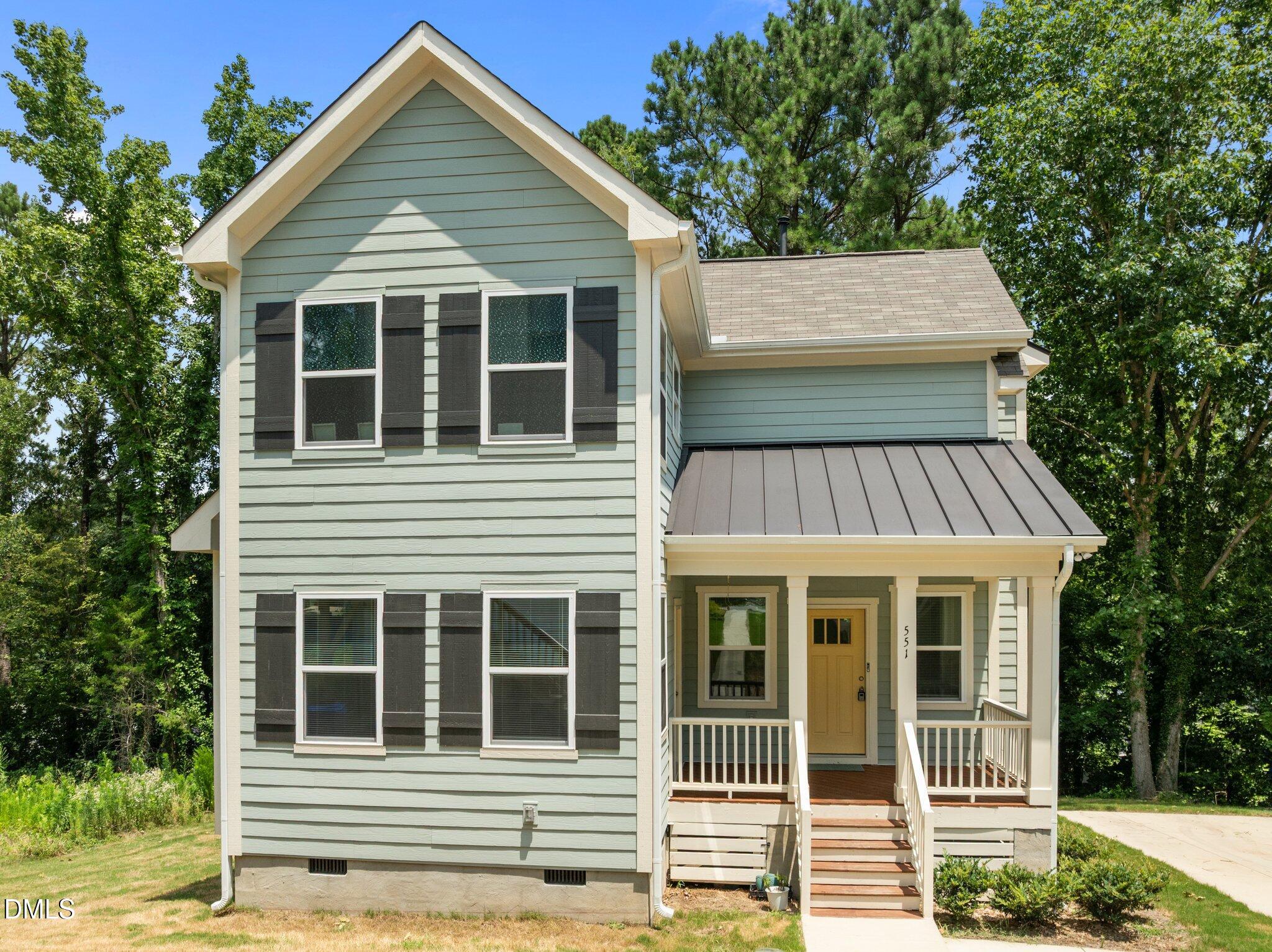 551 Homeland Avenue Durham, NC 27707 - Photo 32 of 32 a view of a house with a door and balcony