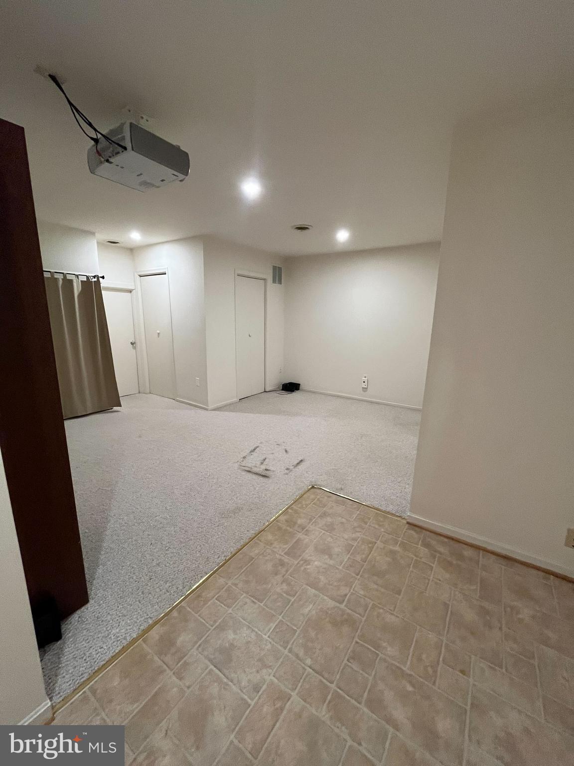 2080 Golf Course Drive Reston, VA 20191 - Photo 14 of 17 a view of a livingroom with a staircase