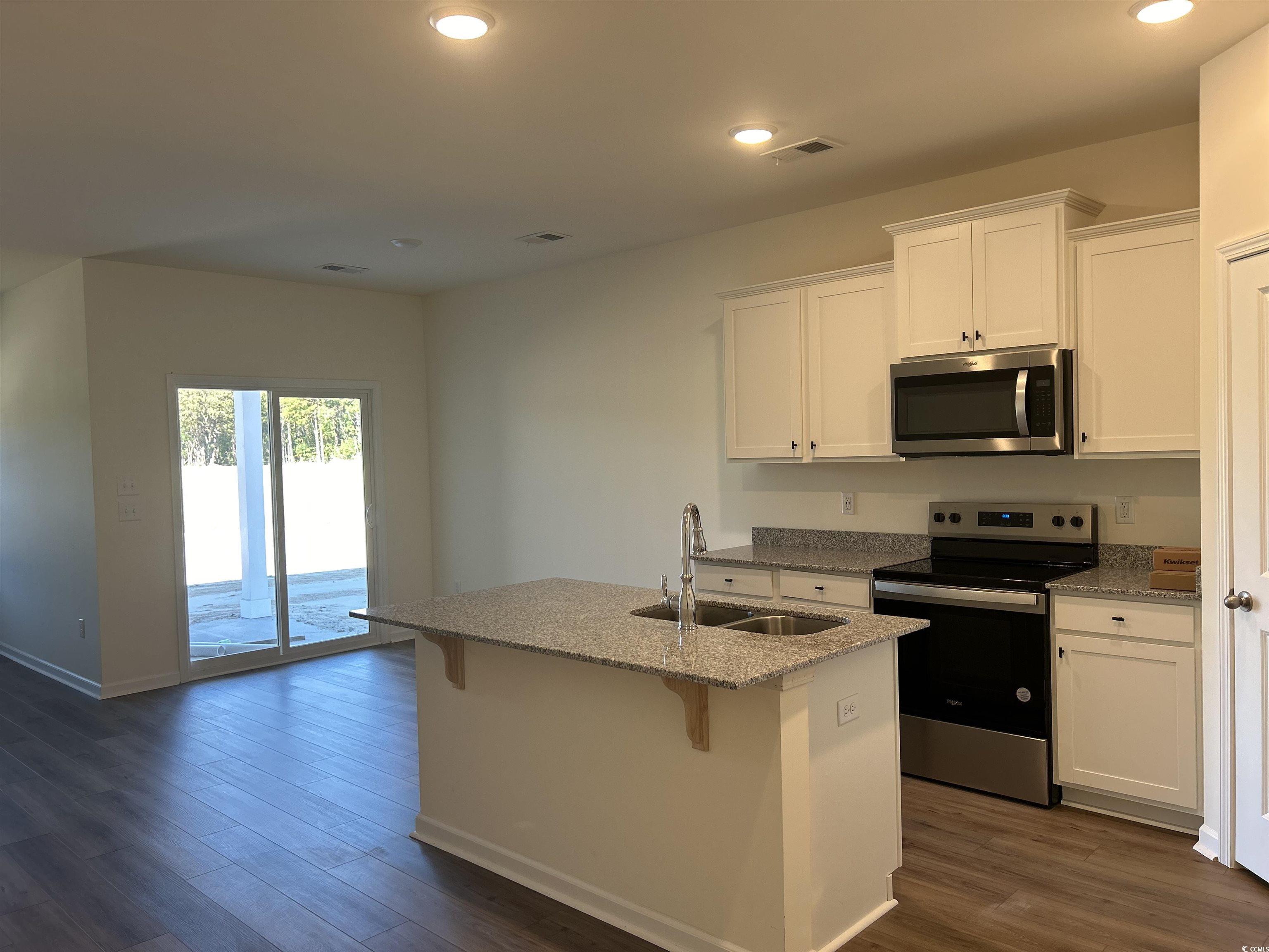 7056 Shady Grove Road Conway, SC 29527 - Photo 8 of 21 Kitchen with sink, stainless steel appliances, whi