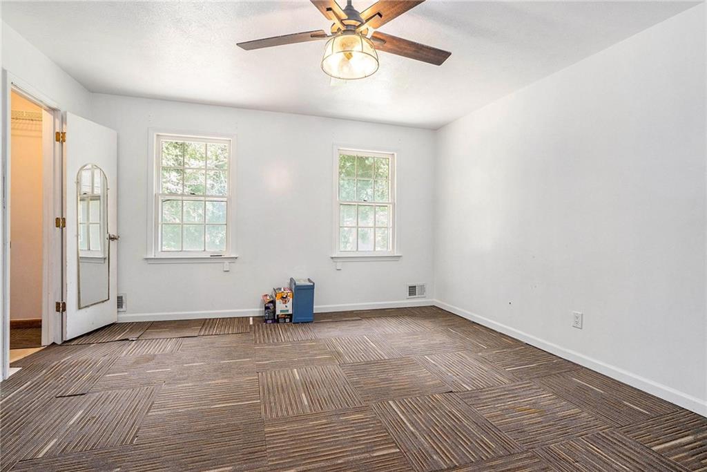 2358 Cannon Hill Road Southwest Lilburn, GA 30047 - Photo 12 of 22 a view of an empty room with a window