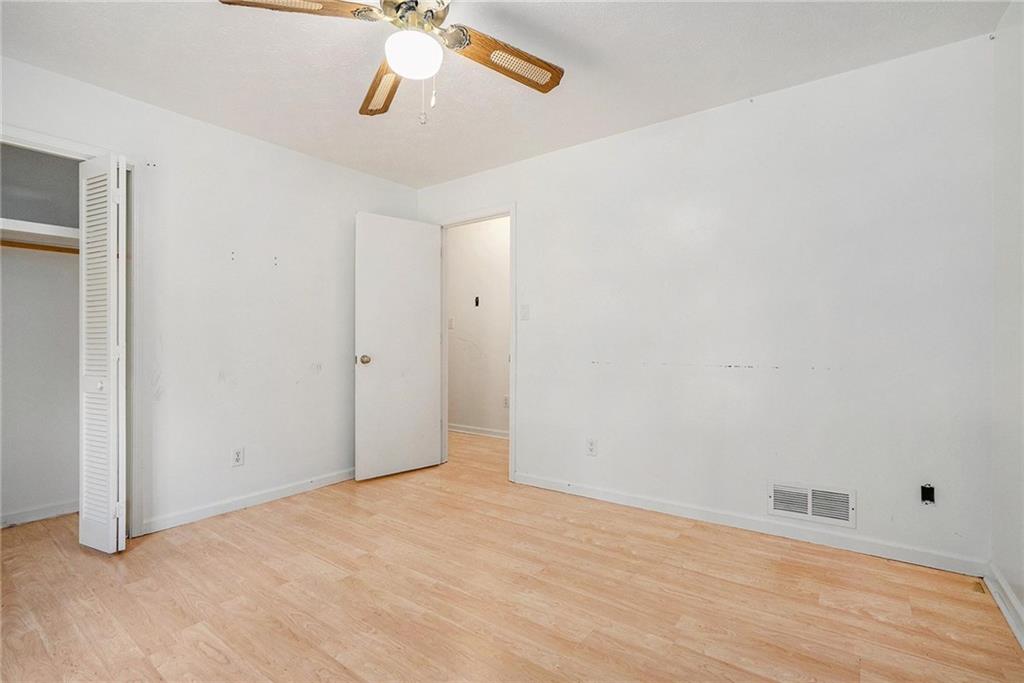 2358 Cannon Hill Road Southwest Lilburn, GA 30047 - Photo 17 of 22 a view of an empty room