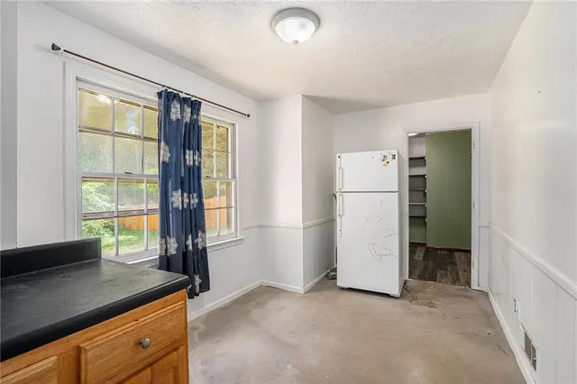 a kitchen with stainless steel appliances granite countertop a stove and a sink