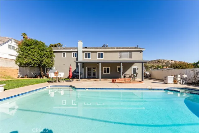 a view of a house with a big yard