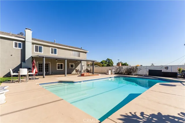 a view of a house with sitting area and furniture