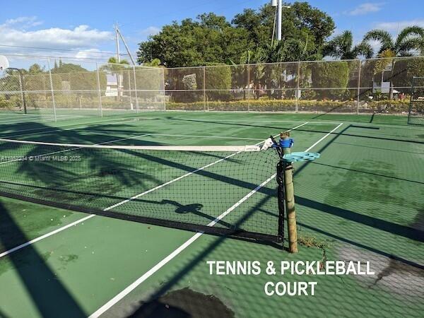 325 Calusa Street Key Largo, FL 33037 - Photo 13 of 23 a view of a tennis court