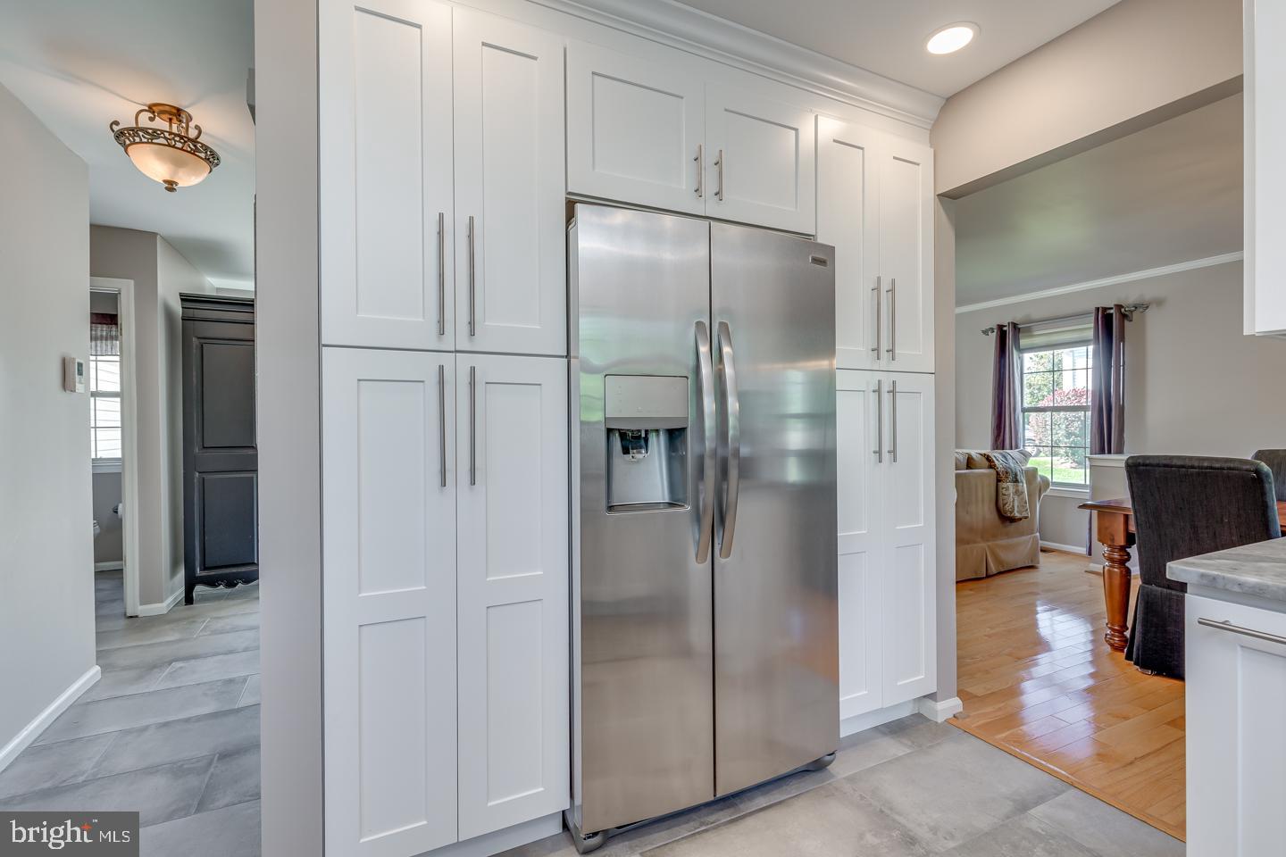 11 Pavilion Road Voorhees, NJ 08043 - Photo 14 of 43 a metallic refrigerator freezer sitting in a kitchen