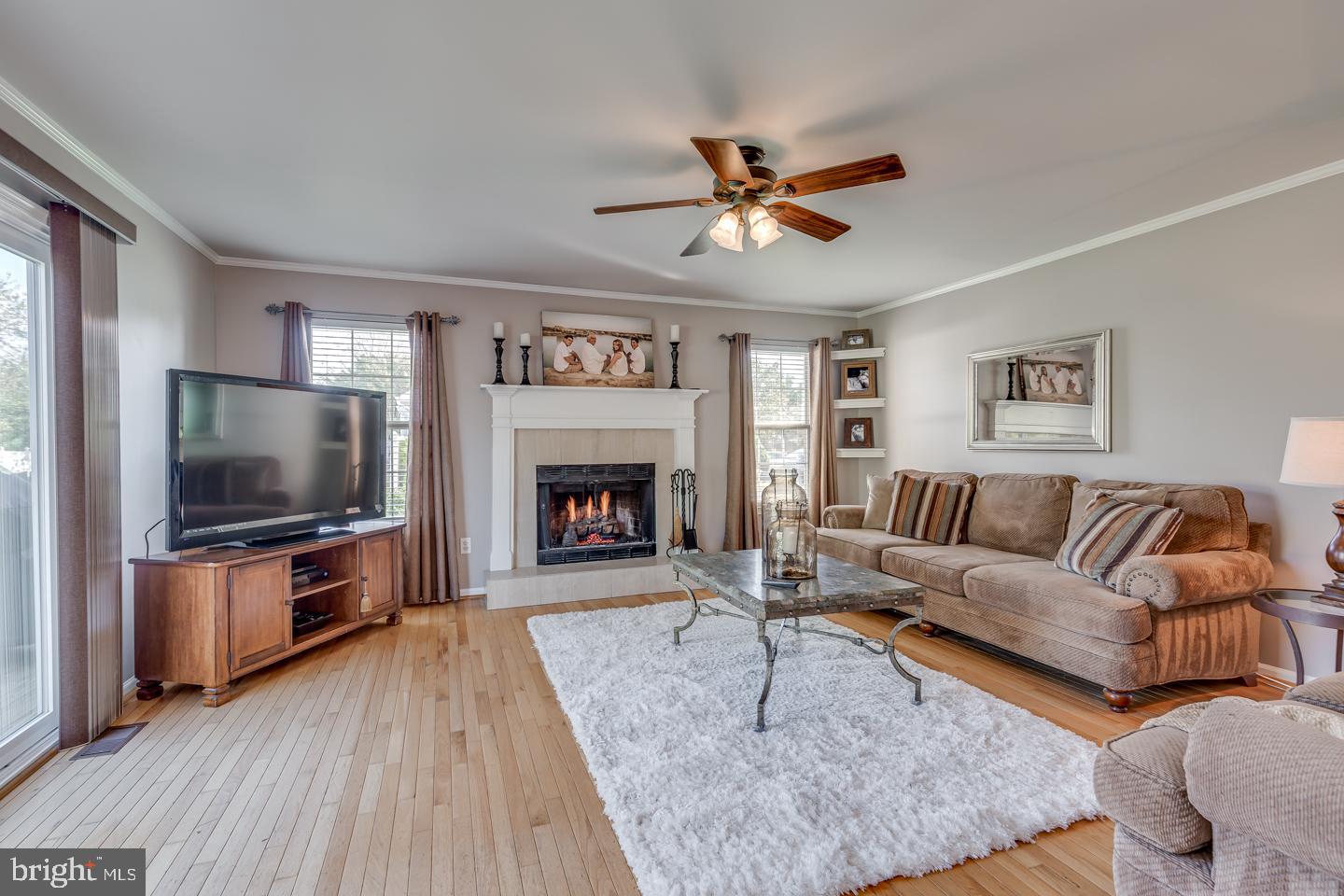 11 Pavilion Road Voorhees, NJ 08043 - Photo 17 of 43 a living room with furniture and a flat screen tv