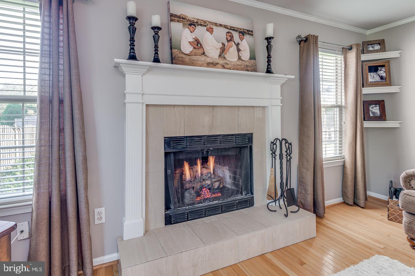 11 Pavilion Road Voorhees, NJ 08043 - Photo 18 of 43 a living room with furniture and a fireplace