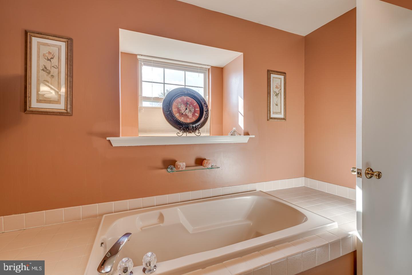11 Pavilion Road Voorhees, NJ 08043 - Photo 30 of 43 a bathroom with a bathtub and a window