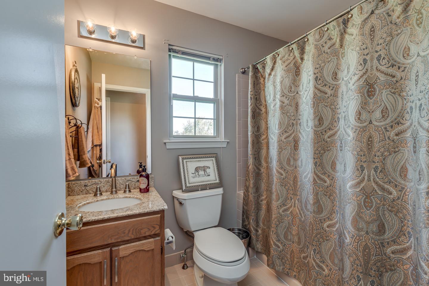 11 Pavilion Road Voorhees, NJ 08043 - Photo 33 of 43 a bathroom with a granite countertop toilet sink and mirror