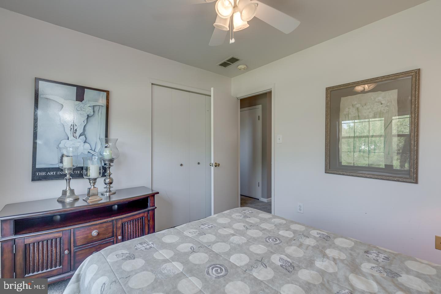 11 Pavilion Road Voorhees, NJ 08043 - Photo 35 of 43 a bedroom with a large bed and a dresser