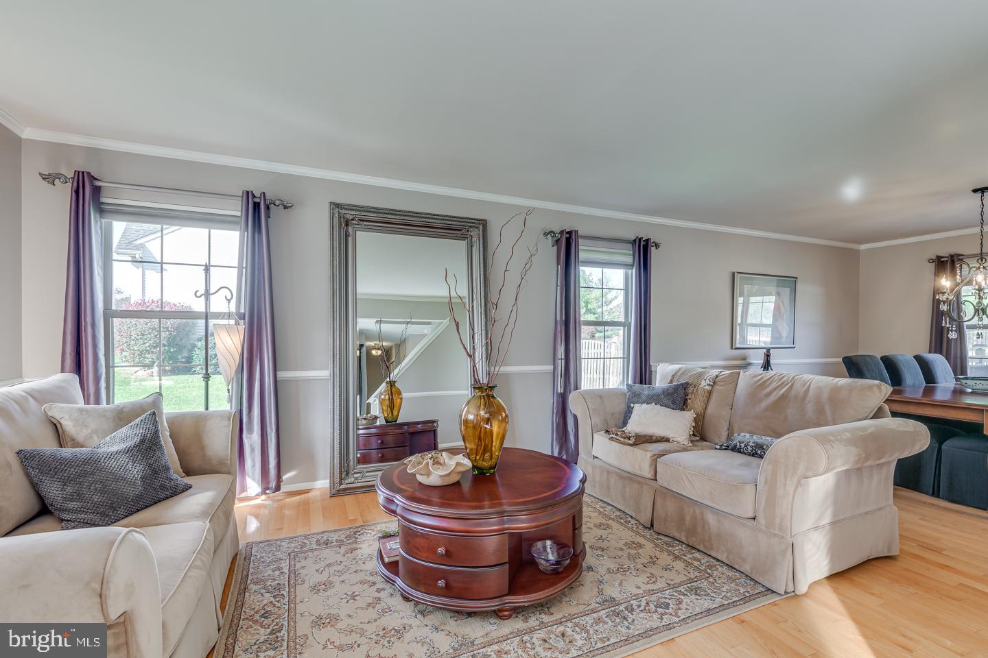 11 Pavilion Road Voorhees, NJ 08043 - Photo 6 of 43 a living room with furniture and a large window