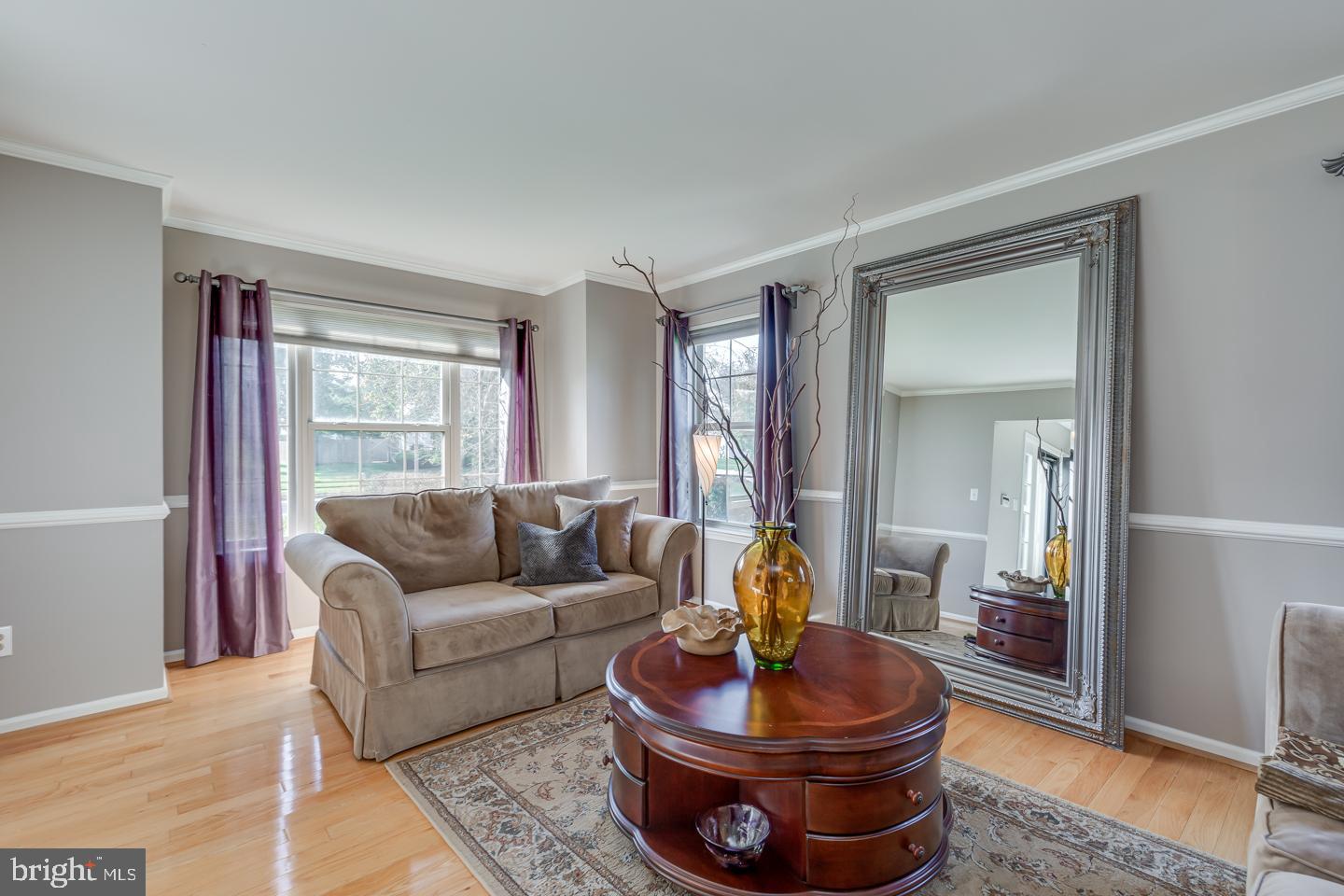 11 Pavilion Road Voorhees, NJ 08043 - Photo 7 of 43 a living room with furniture and a potted plant