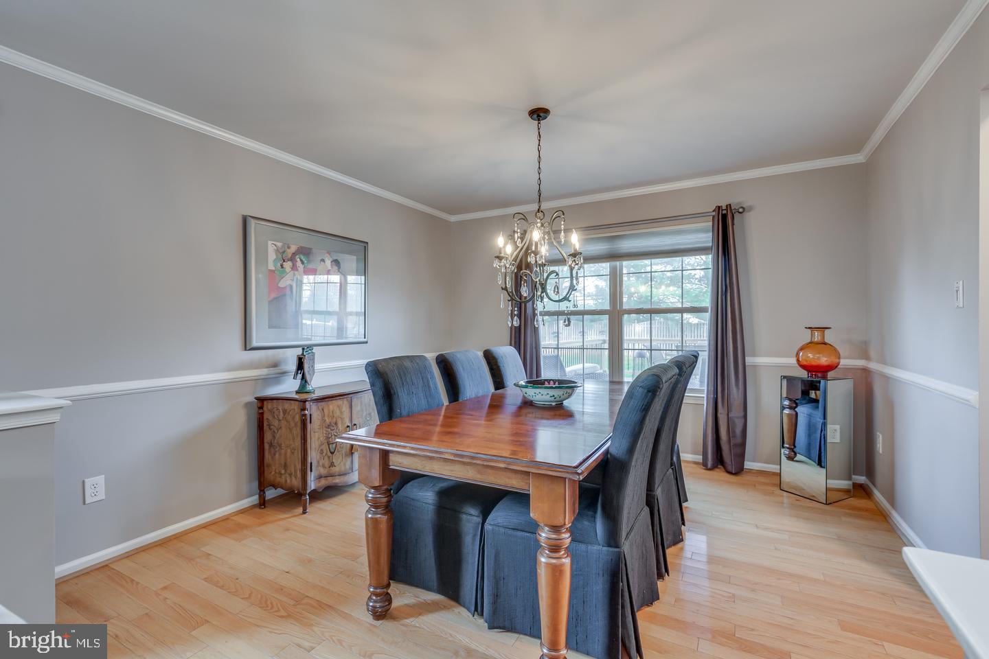 11 Pavilion Road Voorhees, NJ 08043 - Photo 8 of 43 a view of a dining room with furniture window and wooden floor