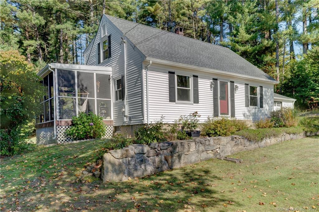 15 Robbie Road Tolland, CT 06084 - Photo 1 of 1 a backyard of a house with seating space