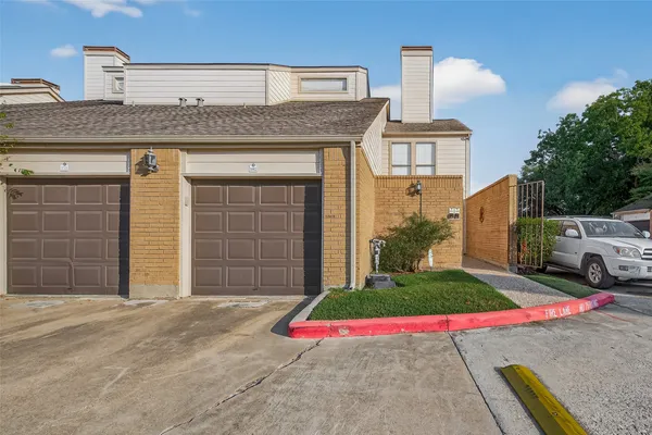 a front view of a house with entertaining space