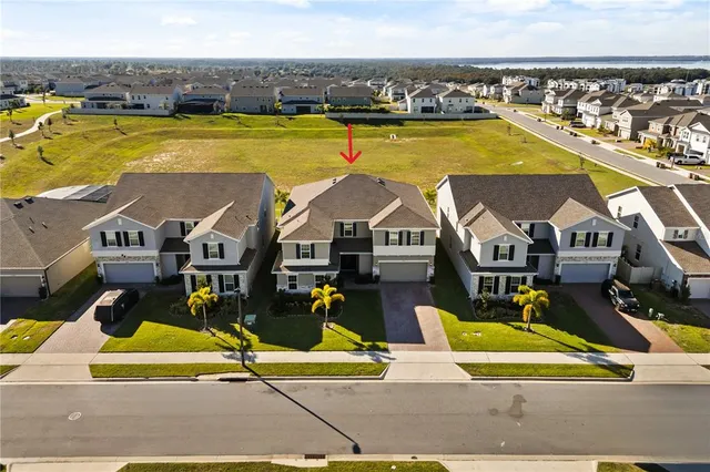 a view of a swimming pool with lounge chair