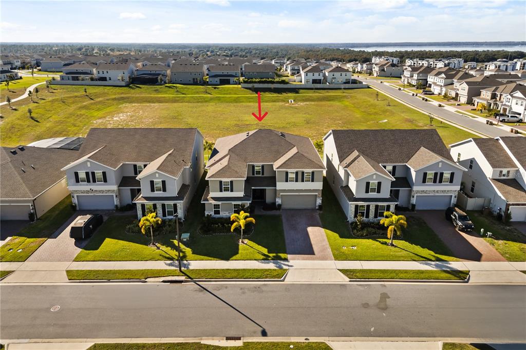 7757 Marsala Street Clermont, FL 34714 - Photo 2 of 75 a view of a swimming pool with lounge chair