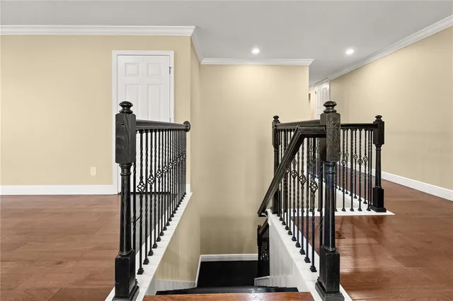 a view of entryway with wooden floor