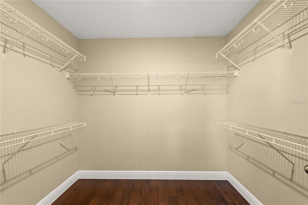 7757 Marsala Street Clermont, FL 34714 - Photo 52 of 75 a view of a room with racks on the wall