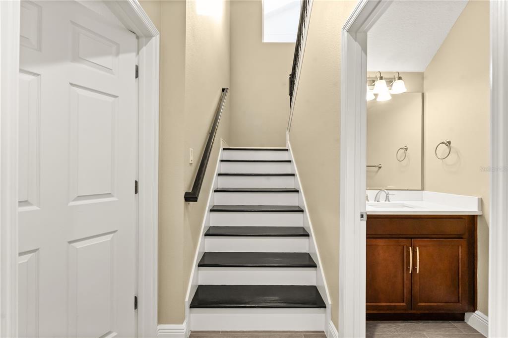 7757 Marsala Street Clermont, FL 34714 - Photo 57 of 75 a view of entryway and hall with wooden floor