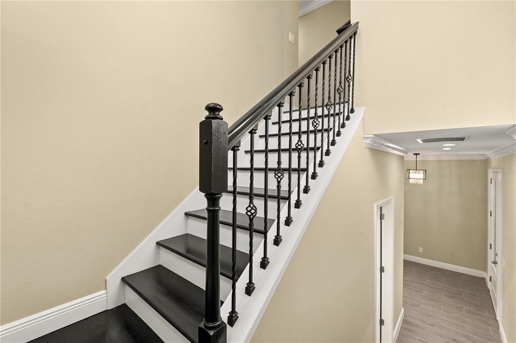 7757 Marsala Street Clermont, FL 34714 - Photo 59 of 75 a view of entryway with wooden floor