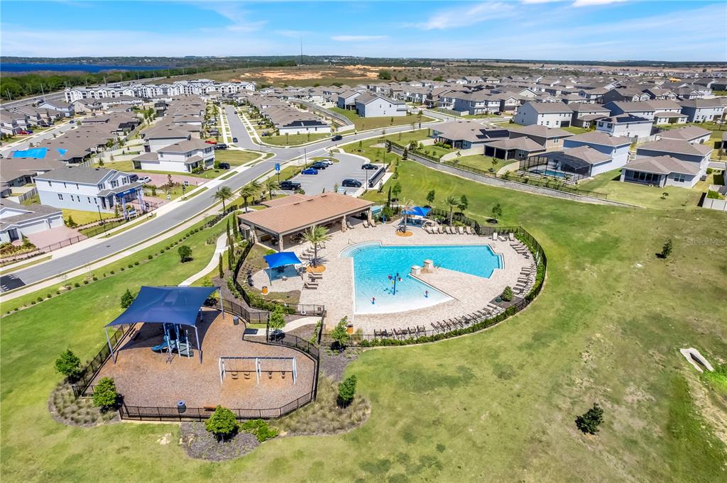 7757 Marsala Street Clermont, FL 34714 - Photo 74 of 75 an aerial view of a house with a swimming pool