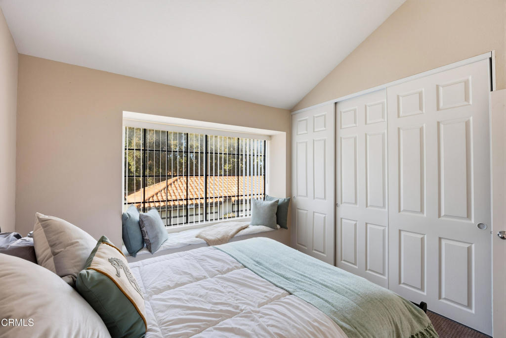 4427 Antigua Way Oxnard, CA 93035 - Photo 20 of 43 a bedroom with a bed and a window